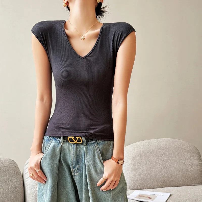 T-shirt pour femmes, col en v, épaules sur le devant, coupe cintrée et cache la poitrine secondaire, haut de tempérament basique, été 2025