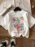 T-shirt à imprimé floral pour femme, un haut d'été décontracté et polyvalent, adapté à un usage quotidien et aux activités de plein air